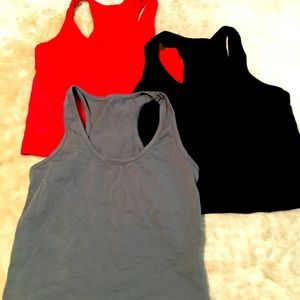 Three pack of cropped work out tanks